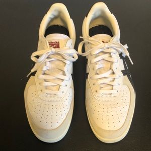 Men’s white Onitsuka Tiger by ASICS sneakers. Size 10. Worn minimally… like new.